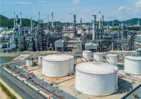 Industrial refinery with large storage tanks, a typical life support systems environment