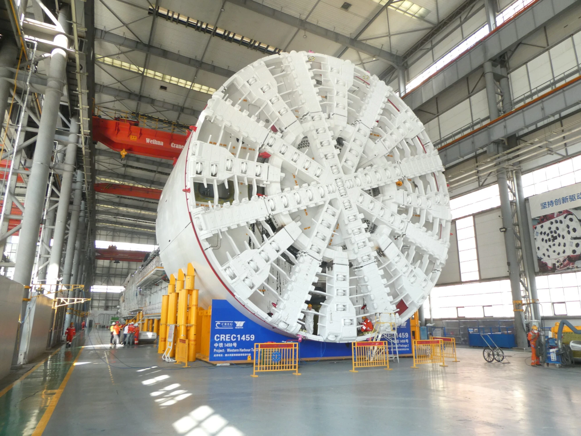 Tunnel boring machine cutting head in a manufacturing facility